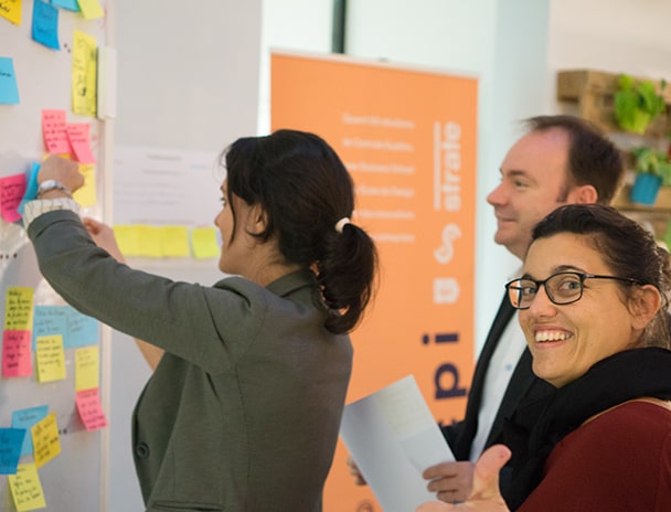 3 people collaborating together in a creativity session for the Deplastify the Planet programme